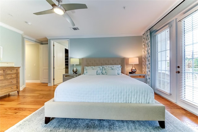 bedroom featuring access to exterior, ceiling fan, light hardwood / wood-style flooring, and ornamental molding