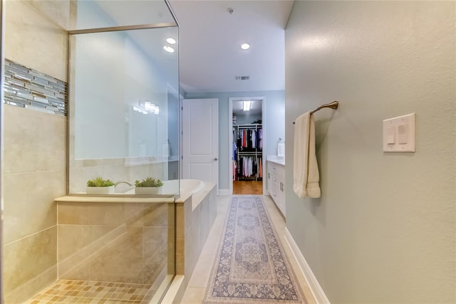 bathroom featuring plus walk in shower