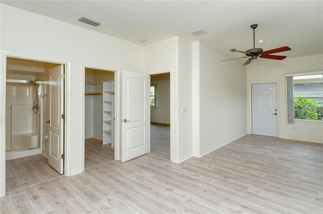 spare room with ceiling fan and light hardwood / wood-style floors