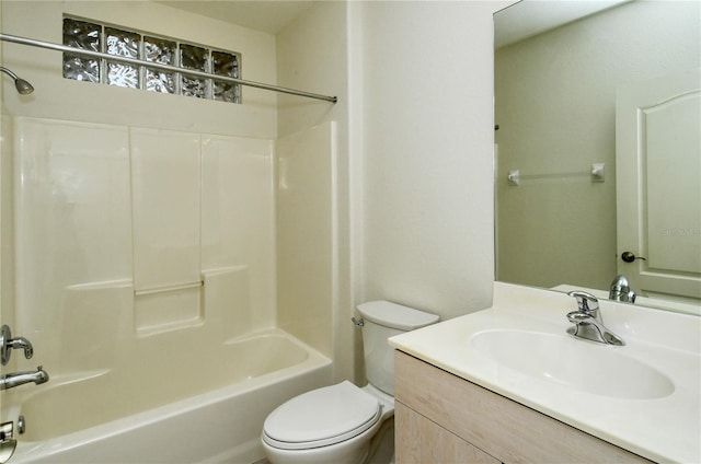 full bathroom with vanity, bathtub / shower combination, and toilet