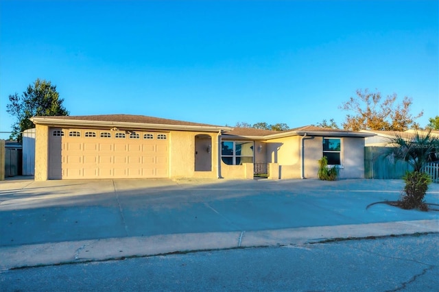 single story home featuring a garage