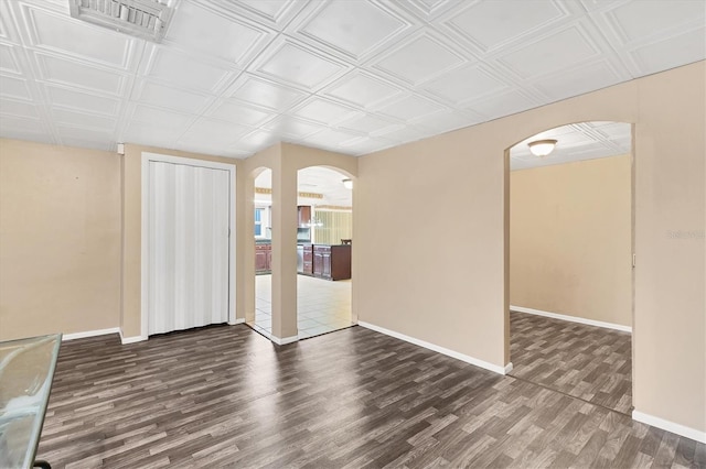 interior space with dark hardwood / wood-style floors