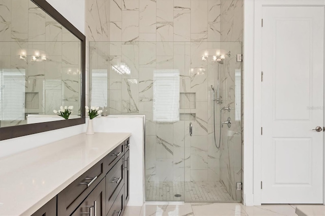 bathroom with vanity and an enclosed shower