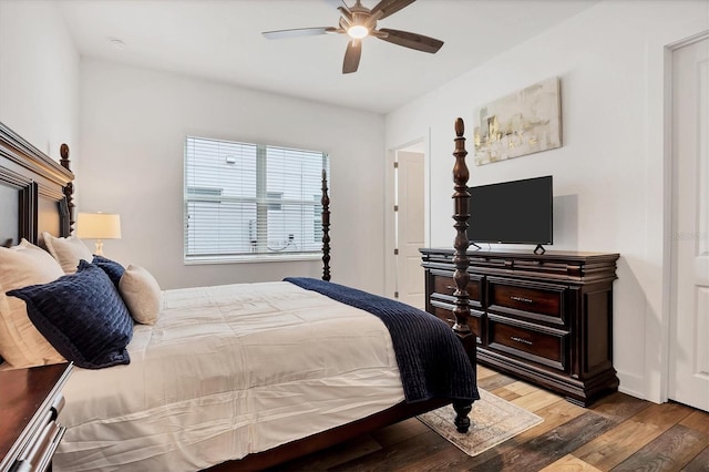 bedroom with ceiling fan and wood-type flooring