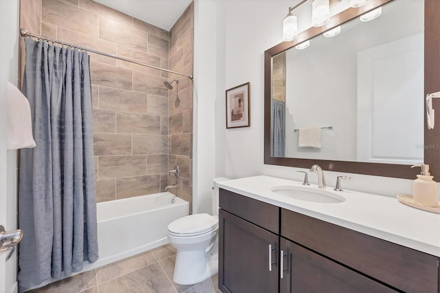 full bathroom featuring tile patterned flooring, shower / bath combo, toilet, and vanity