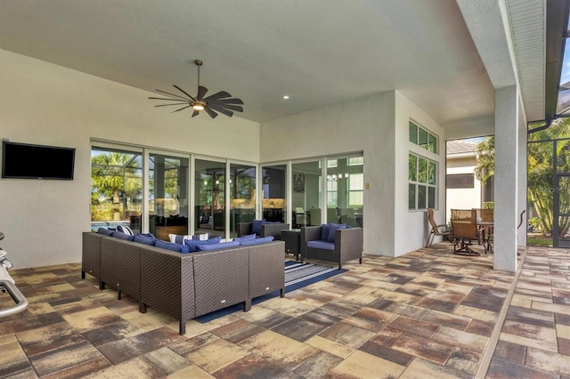 view of patio / terrace featuring an outdoor living space and ceiling fan