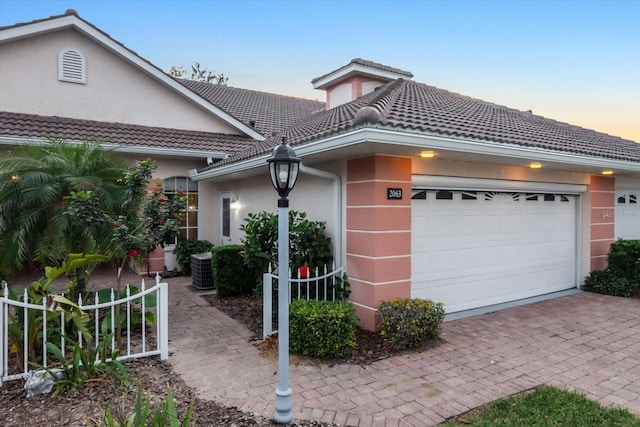 view of front of property featuring a garage