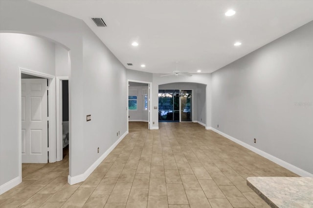 spare room featuring ceiling fan