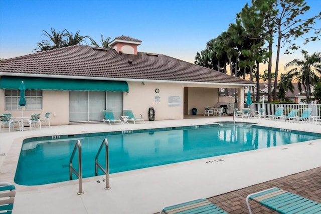 view of pool featuring a patio area