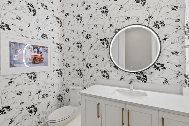 1335 2nd St Unit 301, Sarasota, FL 34236 - bathroom featuring wallpapered walls and vanity