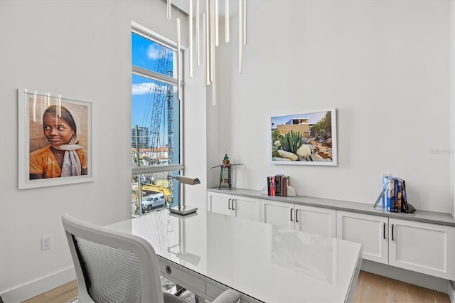 1335 2nd St Unit 301, Sarasota, FL 34236 - office featuring light wood-style flooring and baseboards