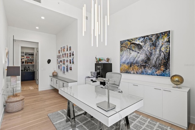 home office featuring light hardwood / wood-style floors