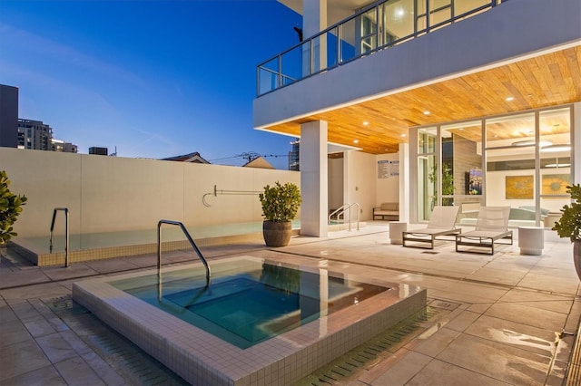 1335 2nd St Unit 301, Sarasota, FL 34236 - view of pool with an in-ground hot tub and a patio