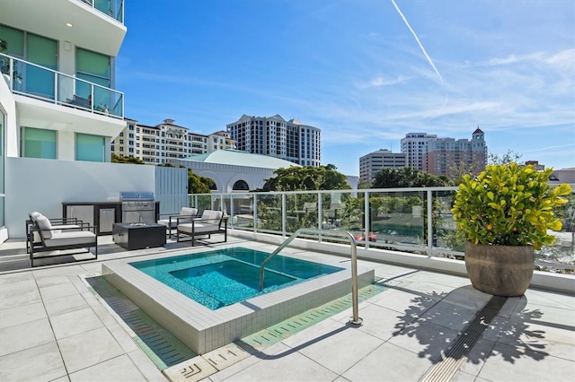 view of swimming pool with a patio area, an in ground hot tub, area for grilling, and an outdoor living space