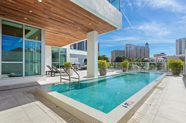 1335 2nd St Unit 301, Sarasota, FL 34236 - community pool featuring a patio area