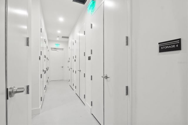 1335 2nd St Unit 301, Sarasota, FL 34236 - hallway featuring finished concrete floors and recessed lighting