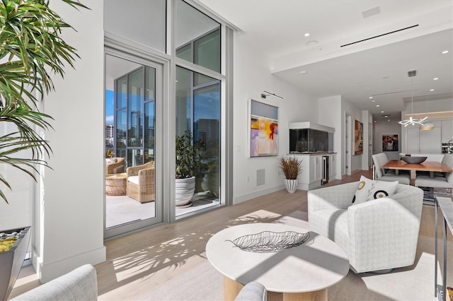 1335 2nd St Unit 301, Sarasota, FL 34236 - living area with light wood finished floors and recessed lighting