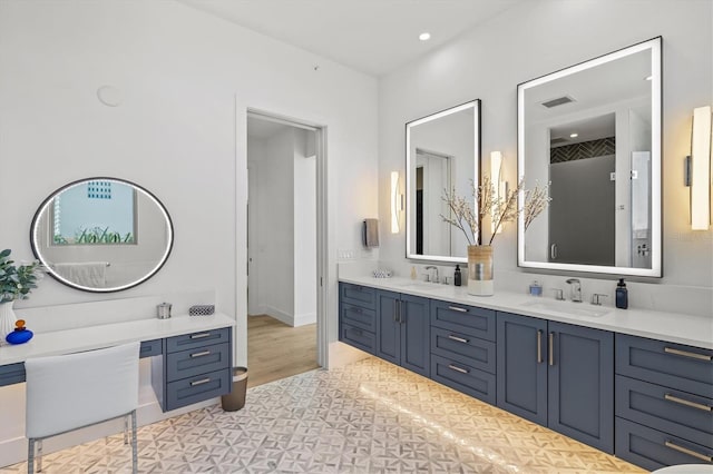 1335 2nd St Unit 301, Sarasota, FL 34236 - bathroom with double vanity and recessed lighting
