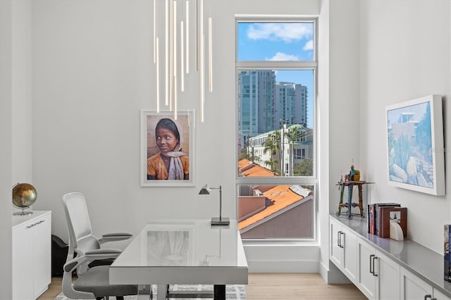1335 2nd St Unit 301, Sarasota, FL 34236 - office area with light wood-style floors