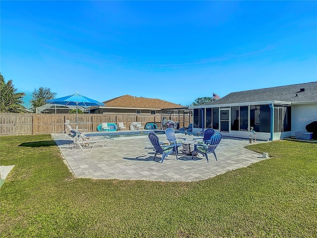 view of patio with a sunroom