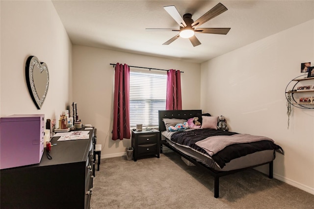 bedroom featuring light carpet and ceiling fan