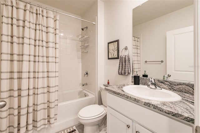 full bathroom featuring vanity, toilet, and shower / bath combo with shower curtain