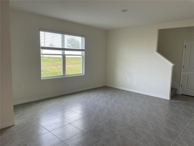 view of tiled spare room