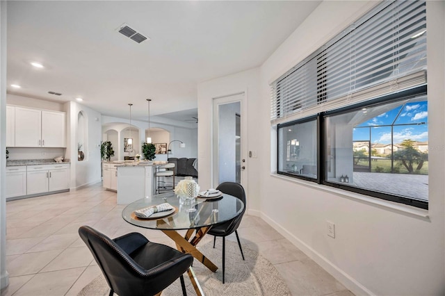 dining room featuring light tile patterned floors