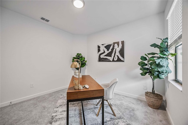 home office with carpet flooring