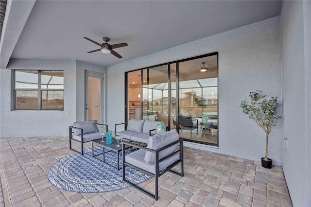 view of patio with an outdoor hangout area and ceiling fan