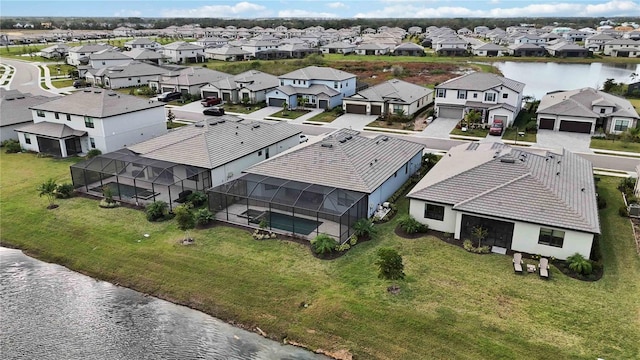 drone / aerial view with a water view