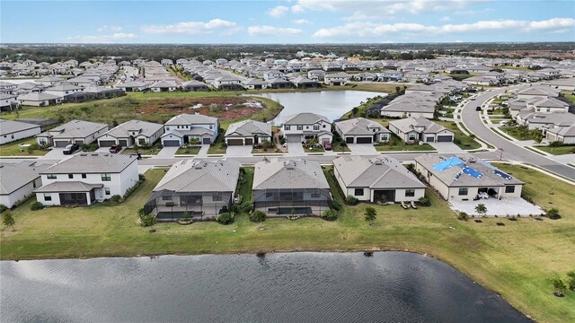 drone / aerial view featuring a water view