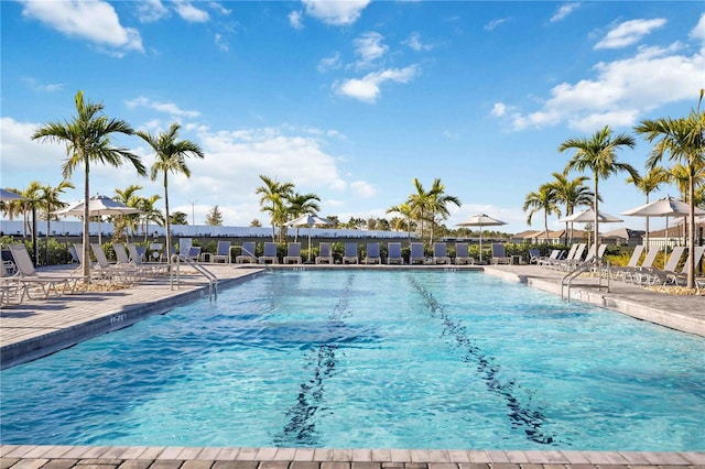 view of swimming pool featuring a patio area