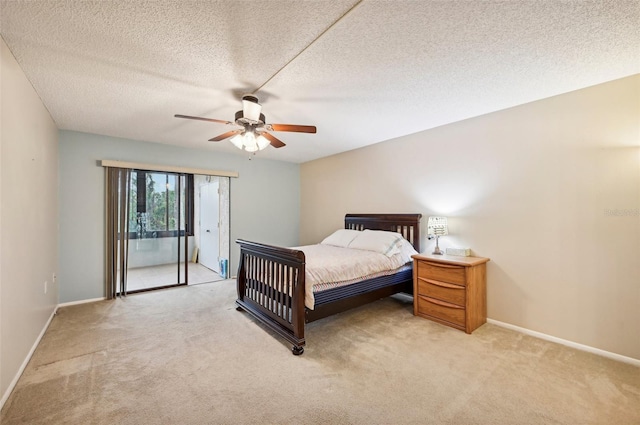 carpeted bedroom featuring ceiling fan, a textured ceiling, and access to outside