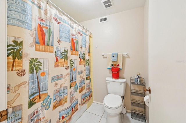 bathroom with walk in shower, tile patterned flooring, and toilet