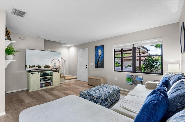 3415 51st Avenue Cir W Unit 206, Bradenton, FL 34210 - living room featuring wood finished floors and baseboards