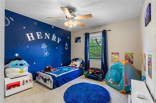 3415 51st Avenue Cir W Unit 206, Bradenton, FL 34210 - bedroom featuring carpet, a textured ceiling, and ceiling fan