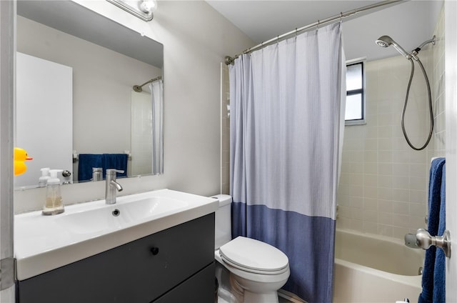 full bathroom featuring vanity, shower / tub combo with curtain, and toilet