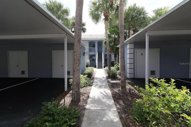 exterior space with a carport