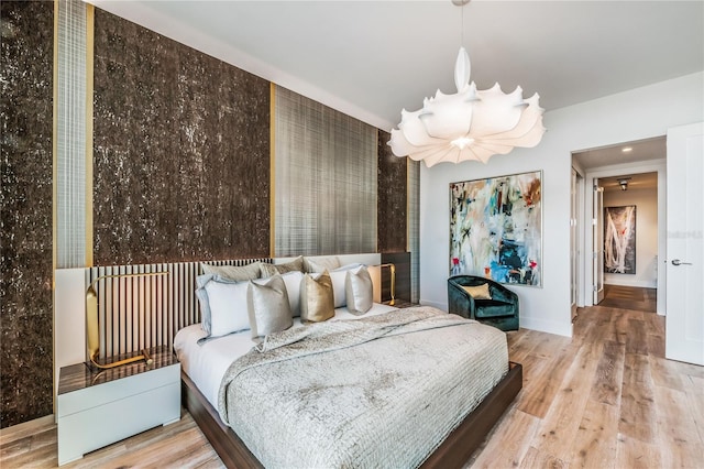 bedroom featuring hardwood / wood-style floors