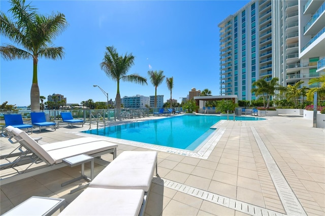 view of swimming pool with a patio