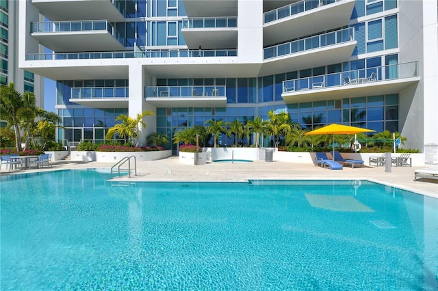 view of pool featuring a patio area