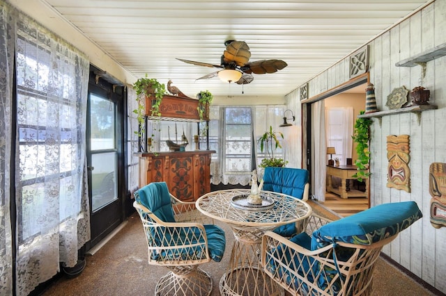 sunroom / solarium with ceiling fan