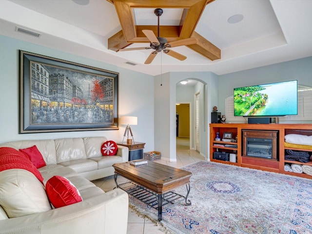 living room with ceiling fan and light tile patterned floors