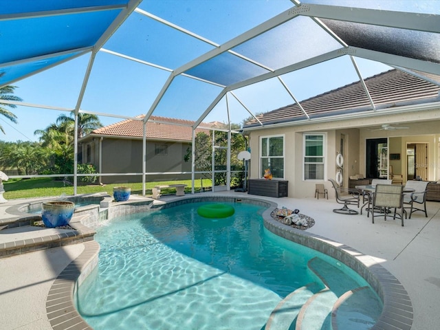 view of pool featuring ceiling fan, a lanai, and a patio