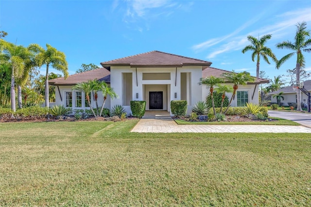 view of front of house with a front lawn