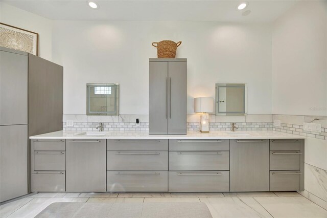 7003 River Club Blvd, Bradenton, FL 34202 - full bathroom featuring double vanity, tasteful backsplash, and recessed lighting