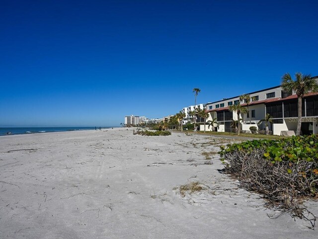 exterior space with a beach view