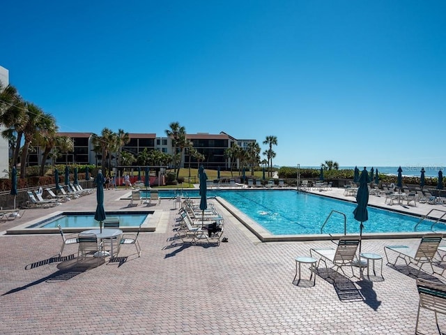 view of swimming pool featuring a patio