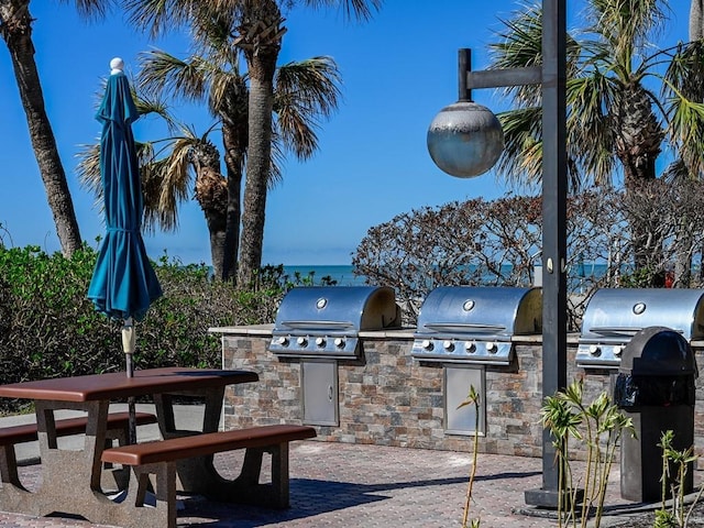 view of patio / terrace featuring grilling area and exterior kitchen